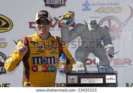 DOVER, DE - May 16:  Kyle Busch wins at the Dover International Speedway for the Autism Speaks 400 presented by Hershey's Milk & Milkshakes on May 16, 2010 in Dover, DE