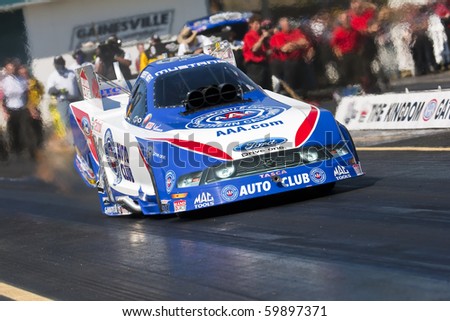 GAINESVILLE, FL - MAR 14:  Robert Hight brings his Auto Club Funny Car down the track during the 41st Annual Gatornationals at the Gainesville Raceway in Gainesville, FL on Mar 14, 2010.