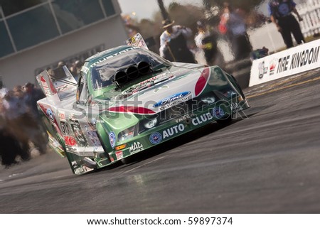GAINESVILLE, FL - MARCH 13:  NHRA Funny Car driver, John Force, brings his car down the track during the 41st Annual Gatornationals at the Gainesville Raceway in Gainesville, FL on Mar 13, 2010