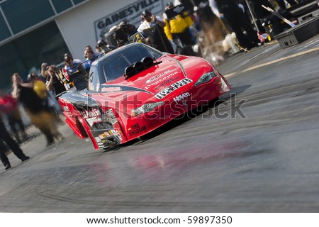 GAINESVILLE, FL - MARCH 13:  NHRA Funny Car driver, Jeff Diehl, brings his car down the track during the 41st Annual Gatornationals at the Gainesville Raceway in Gainesville, FL on Mar 13, 2010