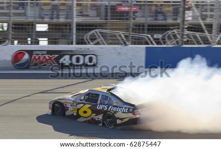 FONTANA, CA - OCT 10:  David Ragan spins off the frontstretch during the Pepsi Max 400 race at the Auto Club Speedway in Fontana, CA on Oct 10, 2010.