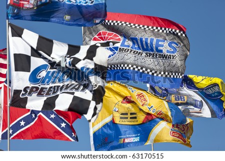 CONCORD, NC - OCT 16:  Fans show their support by flying their flags before the Bank of America 400 race at the Charlotte Motor Speedway in Concord, NC on Oct 16, 2010.