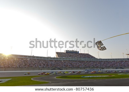 SPARTA, KY - JULY 09:  The NASCAR Sprint Cup Series teams take to the track for the Quaker State 400 race at the Kentucky Speedway in Sparta, KY on July 09, 2011.