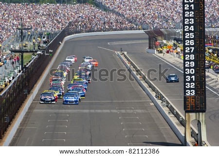 INDIANAPOLIS, IN - JULY 31: The NASCAR Sprint Cup Series teams take to the track for the 18th annual Brickyard 400 race at the Indianapolis Motor Speedway in Indianapolis, IN on Jul 31, 2011.