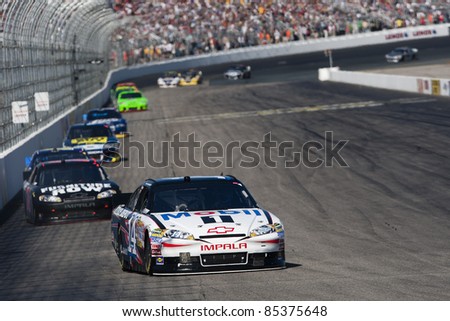 Loudon, NH - SEP 25, 2011:  The NASCAR Sprint Cup Series teams take to the track for the Sylvania 300 race at the New Hampshire Motor Speedway in Loudon, NH on Sept 25, 2011.