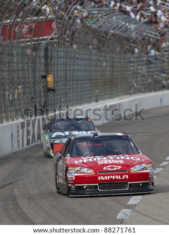 FORT WORTH, TX - NOV 05:  Trevor Bayne (16) wins the O\'Reilly Auto Parts Challenge race at the Texas Motor Speedway in Fort Worth, TX on Nov 06, 2011.