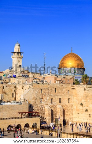 JERUSALEM, ISRAEL - NOVEMBER 15, 2012: Western wall (Wailing Wall) and the Dome of the Rock in Jerusalem.  It has been a site of Jewish pilgrimage for many centuries.