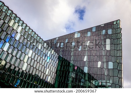 REYKJAVIK, ICELAND - AUGUST 31, 2013: Fragment of Harpa concert hall, Reykjavik, Iceland. Harpa was opened on May 13, 2011. It was selected as Best Performance Venue 2011 by Travel & Leisure magazine