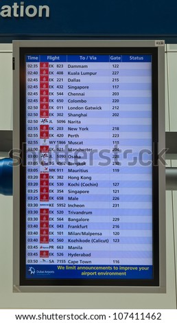 DUBAI - JUNE 02: Flight board in Dubai airport, on June 2, 2012 in Dubai, UAE. The airport is major aviation hub in the Middle East with max throughput of 80 millions passengers per year