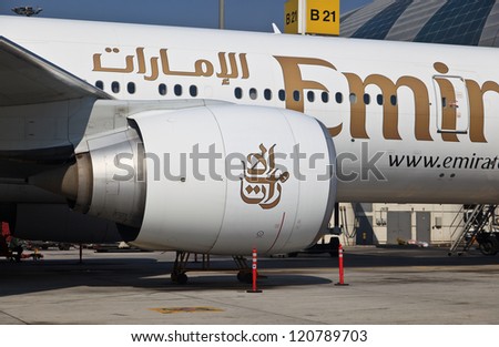 DUBAI, UNITED ARAB EMIRATES - NOVEMBER 10: Engine of Emirates Boeing 777 at Dubai Airport on November 10, 2012 in Dubai, UAE. Emirates is rated as top 10 best world airline flying on youngest fleet