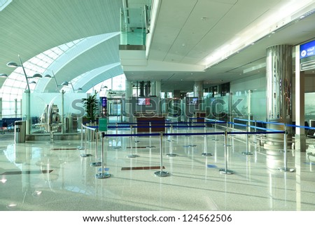 DUBAI, UAE - JAN 6: Boarding gate in in Terminal 3 at Dubai Airport, one of the busiest airports, on January 6, 2013. It\'s world largest building by floor space and world largest airport terminal.