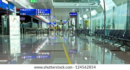 DUBAI, UAE - JAN 6: The newer Terminal 3 (Emirates)  at Dubai Airport, one of the busiest airports, on January 6, 2013. It\'s world largest building by floor space and world largest airport terminal.