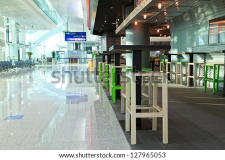 DUBAI, UAE - JAN 6: The newer Terminal 3 (Emirates) at Dubai Airport, one of the busiest airports, on January 6, 2013. It\'s world largest building by floor space and world largest airport terminal.