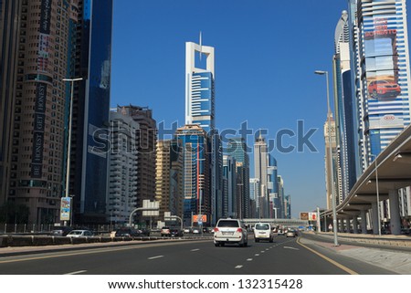 DUBAI - JANUARY 6: General view on trunk road and skyscrapers on January 6, 2013 in Dubai, UAE. Dubai is the most fast-growing city on the Earth.