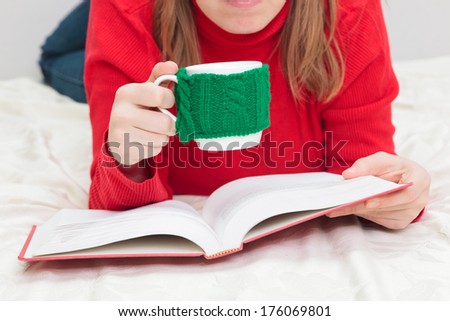 Home study, reading book with cup of coffee at home