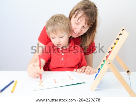 mother and son learning math, early education