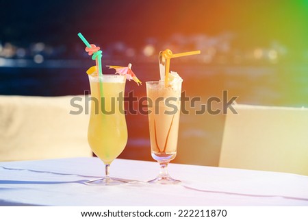 Cocktails against the sea, summer vacation