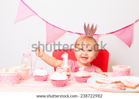 cute little princess at first birthday party