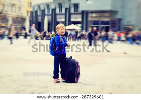 happy little boy travel in Europe, kids travel