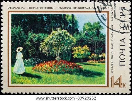 USSR - CIRCA 1973: The postal stamp printed in USSR is shown by the woman in white clothes with an umbrella in a garden, CIRCA 1973.