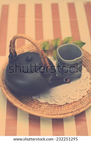 set of tea for one in retro filter effect lighting or instagram filter