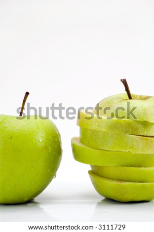 opposing apples one whole and one sliced