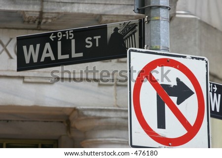 wall street sign with a no right turn sign