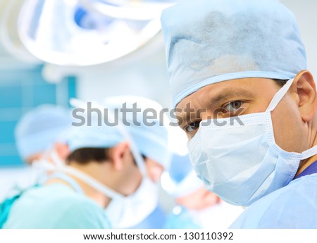 Attentive Look Of Surgeon In Operation Room