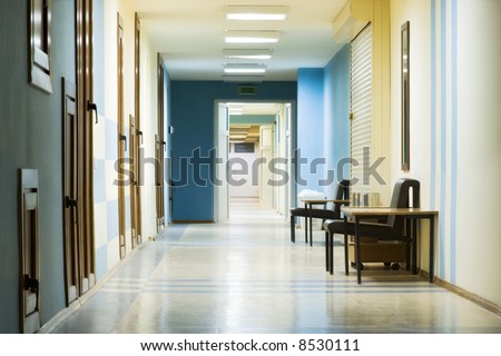 reception in hospital with corridor at night.