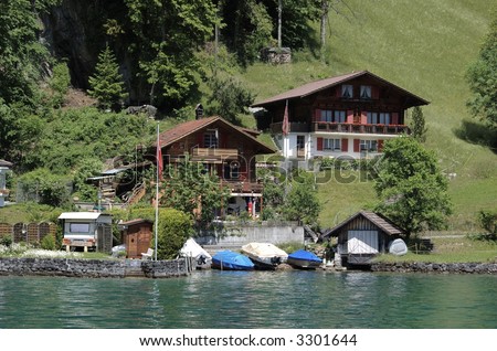 Chalets and boats at Lake Thun, Switzerland