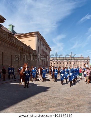 STOCKHOLM - AUGUST 8 : Changing of the guard ceremony. It takes place every day at noon opposite the Royal Palace. This show has attracted a lot of tourists on August 8, 2003 in Stockholm, Sweden