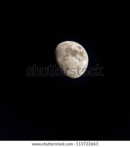 The moon in the night sky over the Mizpe Ramon - Israel