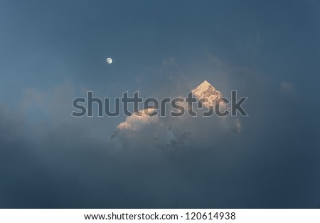 Moon over Mt. Everest and Nuptse at sunset (view from Kala Patthar) - Everest region, Nepal, Himalayas