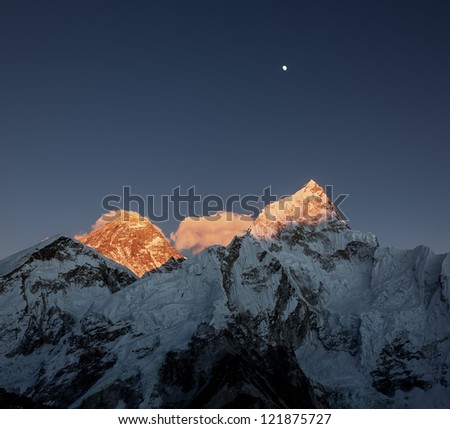 The Moon, Mt. Everest (8848 m), and Nuptse (7864 m) at sunset (view from Kala Patthar) - Nepal, Himalayas