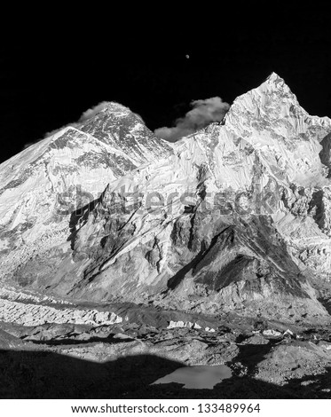 The moon rises over the Mt. Everest (8848 m)  (view from Kala Patthar) - Nepal, Himalayas (black and white)