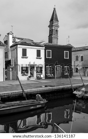 The houses near the old leaning Church Tower - Burano, Venice, Italy (black and white)