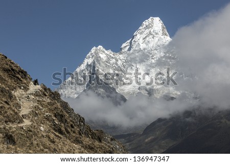 View of the Ama Dablam (6814 m) from South in clouds - Everest region, Nepal, Himalayas