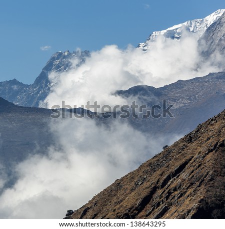 Cloud mountain in the region of the peak Kantega - Everest region, Nepal, Himalayas