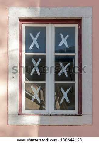 The window in the repaired house - Lisbon, Portugal