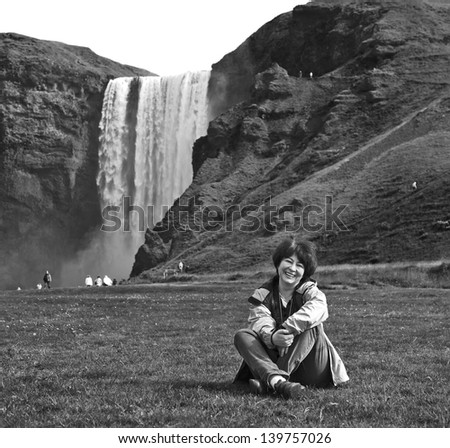 Ã?Â�Ã?Â Ã?Â?? woman near Skogafoss waterfall in Iceland (black and white)