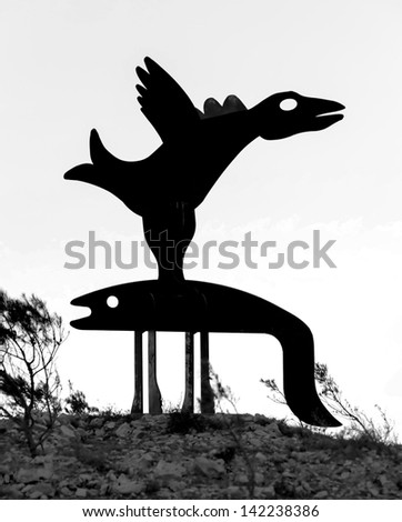 BEER SHEVA, ISRAEL - AUGUST 27: Crow carrier fish. The sculptures have been restored in the park near Beer Sheve August 27, 2012 in Israel (black and white)
