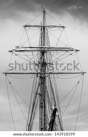 The masts and rigging boat in the port of Reykjavik city, Iceland (black and white)