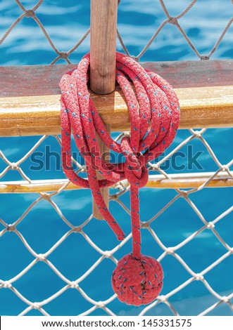Red rope for mooring a vessel