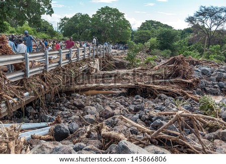 MANYARA, TANZANIA - NOVEMBER 28: The catastrophic debris flow destroyed a road between national parks Manyara and Ngorongoro. Car traffic was restored on the same day, on November 28, 2011 in Tanzania