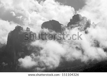 Tepyi covered with clouds in the Canaima national park - Venezuela, South America (black and white)