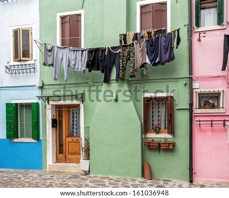The linen dried outside the windows on Burano - Venice, Italy