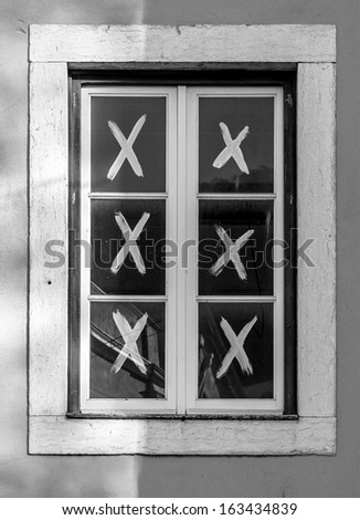 The window in the repaired house - Lisbon, Portugal (black and white)