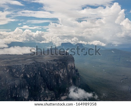 The view from the plane of the table mountain (tepyu) in the Gran Sabana region in poor weather - Venezuela, South America