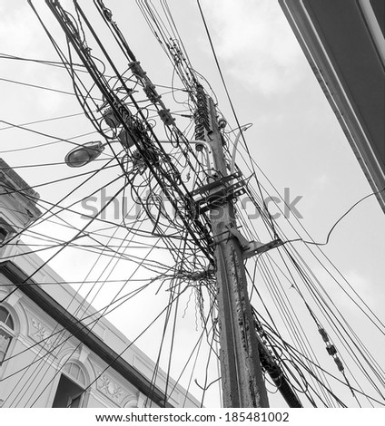 The chaos of cables and wires in Valparaiso - Chile (black and white)