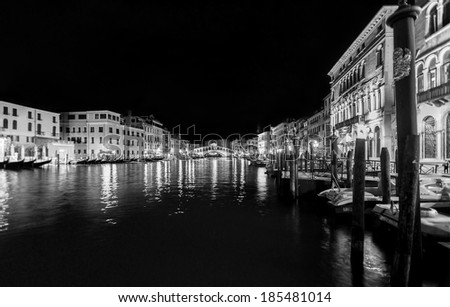 Venice Grand Canal near the Rialto bridge at night - Venice, Italy (black and white)